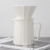 White geometric hand punch set